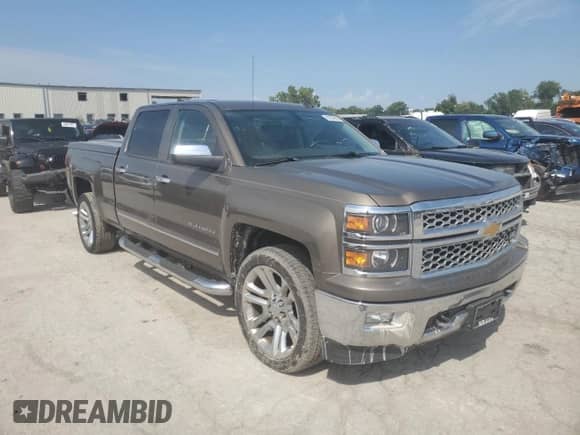 2014 Chevrolet Silverado 1500 LTZ with VIN 3GCUKSEC2EG128866, listed as a Copart auction lot 67001695 with 186,402 mi miles and Salvage title. Bid and sale history available at DreamBid. Image 4.