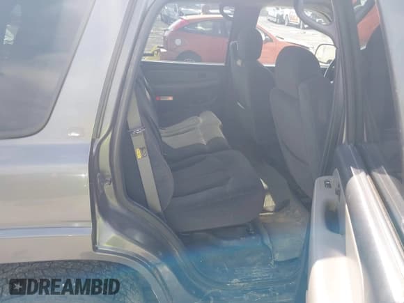 ✅ 2002 Chevrolet Tahoe LS • VIN: 1GNEK13Z82R260197 • Lot: 42761535. Listed on IAAI with 242,815 mi. Free auction sales archive from the USA and detailed vehicle history report at DreamBid. Image 8.