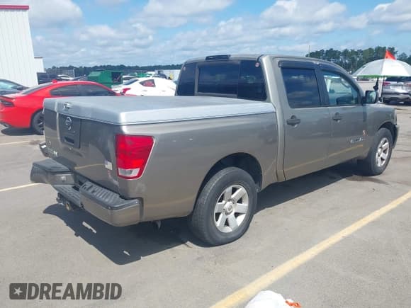 ✅ 2006 Nissan Titan XE • VIN: 1N6BA07A36N519461 • Lot: 42515719. Listed on IAAI with 346,406 mi. Free auction sales archive from the USA and detailed vehicle history report at DreamBid. Image 4.