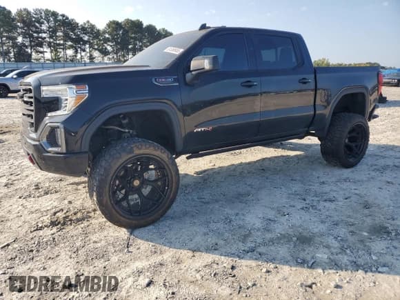 ✅ 2022 GMC Sierra 1500 AT4 • VIN: 1GTP9EEL9NZ121911 • Lot: 81358955. Listed on Copart with 33,958 mi. Free auction sales archive from the USA and detailed vehicle history report at DreamBid. Image 1.