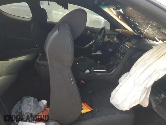 ✅ 2013 Hyundai Genesis Coupe 2.0T • VIN: KMHHT6KD2DU109907 • Lot: 69308955. Wystawiony na Copart z przebiegiem Nie podano. Bezpłatny archiwum sprzedaży aukcyjnych z USA i szczegółowy raport historii pojazdu na DreamBid. Zdjęcie 10.