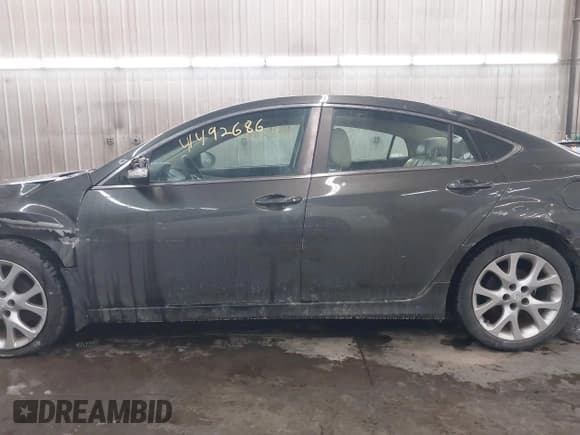 ✅ 2012 Mazda 6 S Grand Touring • VIN: 1YVHZ8CBXC5M00217 • Лот: 41492686. Опубликован ранее на IAAI с пробегом 101 571 миль. Бесплатный доступ к архиву аукционных продаж из США и подробный отчёт об истории автомобиля на DreamBid. Изображение 14.