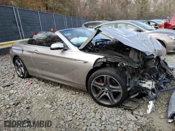 ✅ 2016 BMW 6 Series 650i xDrive • VIN: WBA6F7C50GD930473 • Лот: 79723834. Опубликован ранее на Copart с пробегом 100 131 миль. Бесплатный доступ к архиву аукционных продаж из США и подробный отчёт об истории автомобиля на DreamBid. Изображение 4.