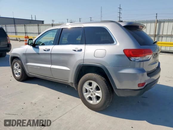 ✅ 2015 Jeep Grand Cherokee Laredo • VIN: 1C4RJEAG0FC137167 • Лот: 71719725. Опубликован ранее на Copart с пробегом 91 537 миль. Бесплатный доступ к архиву аукционных продаж из США и подробный отчёт об истории автомобиля на DreamBid. Изображение 2.