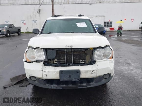 ✅ 2008 Jeep Grand Cherokee Laredo • VIN: 1J8GR48KX8C164165 • Lot: 41920548. Listed on IAAI with 215,545 mi. Free auction sales archive from the USA and detailed vehicle history report at DreamBid. Image 12.
