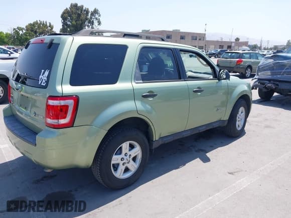 ✅ 2009 Ford Escape Hybrid • VIN: 1FMCU49329KA08605 • Lot: 42367265. Listed on IAAI with 166,562 mi. Free auction sales archive from the USA and detailed vehicle history report at DreamBid. Image 4.
