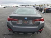 ✅ 2025 BMW i4 M50 • VIN: WBY33HD03SFV48909 • Lot: 92946215. Wystawiony na Copart z przebiegiem 2 028 mil. Bezpłatny archiwum sprzedaży aukcyjnych z USA i szczegółowy raport historii pojazdu na DreamBid. Zdjęcie 6.