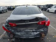 ✅ 2014 Infiniti Q50 Premium • VIN: JN1BV7ARXEM694098 • Lot: 43748947. Listed on IAAI with 209,637 mi. Free auction sales archive from the USA and detailed vehicle history report at DreamBid. Image 16.