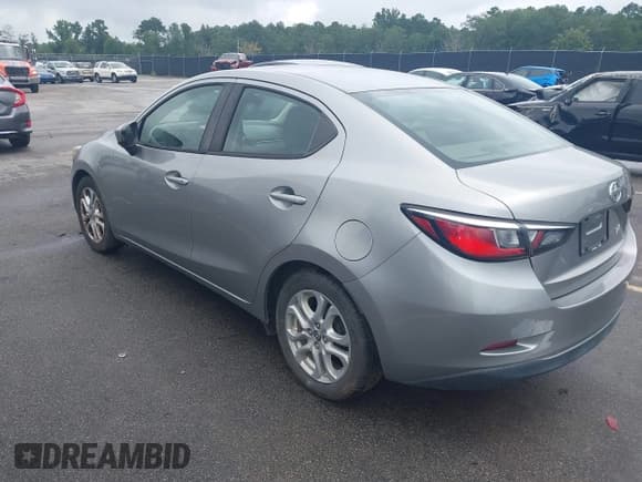 ✅ 2016 Scion iA • VIN: 3MYDLBZV3GY133291 • Лот: 42962206. Опубликован ранее на IAAI с пробегом 150 813 миль. Бесплатный доступ к архиву аукционных продаж из США и подробный отчёт об истории автомобиля на DreamBid. Изображение 3.