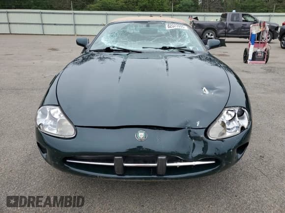✅ 1999 Jaguar XK • VIN: SAJGX2048XC039096 • Lot: 62523995. Wystawiony na Copart z przebiegiem 77 814 mil. Bezpłatny archiwum sprzedaży aukcyjnych z USA i szczegółowy raport historii pojazdu na DreamBid. Zdjęcie 5.