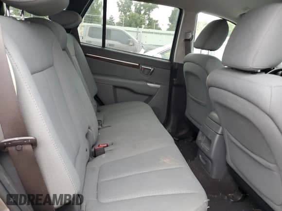 2012 Hyundai Santa Fe GLS z VIN 5XYZG3AB3CG123312, wystawiony jako Copart lot #70588935 z przebiegiem Nie podano mil oraz Szkoda całkowita • Salvage title. Historia ofert i sprzedaży dostępna na DreamBid. Obrazek 11.