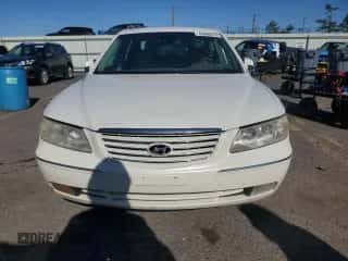 2006 Hyundai Azera SE с VIN KMHFC46F26A136584, выставлен на аукционе Copart как лот 49860275 с пробегом 224 972 миль миль и Списание • Salvage title. История ставок и продаж доступна на DreamBid. Изображение 5.