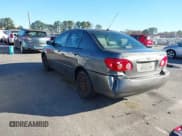 ✅ 2006 Toyota Corolla LE • VIN: 2T1BR32E96C604945 • Lot: 43727742. Listed on IAAI with 299,999 mi. Free auction sales archive from the USA and detailed vehicle history report at DreamBid. Image 3.