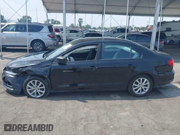 ✅ 2015 Volkswagen Jetta SE • VIN: 3VWD17AJXFM259306 • Lot: 42418042. Listed on IAAI with 199,780 mi. Free auction sales archive from the USA and detailed vehicle history report at DreamBid. Image 13.