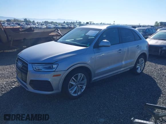 ✅ 2018 Audi Q3 Premium • VIN: WA1ECCFS0JR013832 • Lot: 42007550. Listed on IAAI with 60,935 mi. Free auction sales archive from the USA and detailed vehicle history report at DreamBid. Image 18.