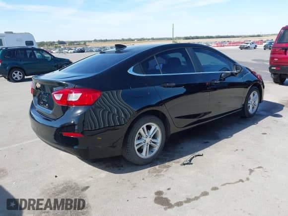 2018 Chevrolet Cruze LT with VIN 1G1BE5SM0J7126125, listed as a IAAI auction lot 43422433 with 50,301 mi miles and . Bid and sale history available at DreamBid. Image 4.