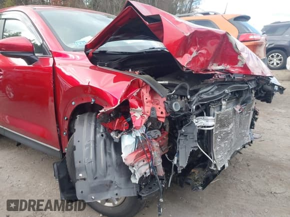 ✅ 2022 Mazda CX-5 S Preferred • VIN: JM3KFBCM5N0573346 • Lot: 43732540. Listed on IAAI with 48,112 mi. Free auction sales archive from the USA and detailed vehicle history report at DreamBid. Image 6.