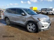 ✅ 2018 Honda Pilot EX-L • VIN: 5FNYF5H67JB002287 • Lot: 84826144. Listed on Copart with 129,280 mi. Free auction sales archive from the USA and detailed vehicle history report at DreamBid. Image 4.