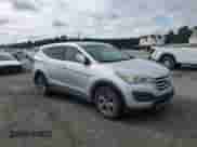 2015 Hyundai Santa Fe with VIN 5XYZT3LB8FG287913, listed as a Copart auction lot 68921875 with 209,759 mi miles and Salvage title. Bid and sale history available at DreamBid. Image 4.