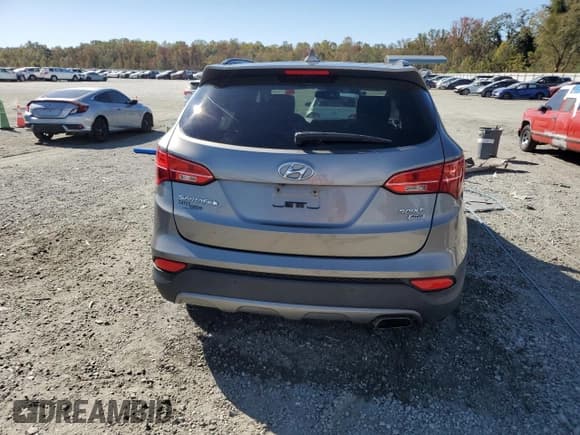 ✅ 2014 Hyundai Santa Fe • VIN: 5XYZUDLB6EG143004 • Lot: 89884605. Listed on Copart with 135,664 mi. Free auction sales archive from the USA and detailed vehicle history report at DreamBid. Image 6.