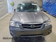 ✅ 2006 Mazda Tribute S • VIN: 4F2CZ96136KM29153 • Lot: 94643295. Listed on Copart with 41,381 mi. Free auction sales archive from the USA and detailed vehicle history report at DreamBid. Image 5.