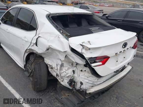 2023 Toyota Camry SE with VIN 4T1T11BK1PU077750, listed as a IAAI auction lot 42047470 with 51,015 mi miles and . Bid and sale history available at DreamBid. Image 6.