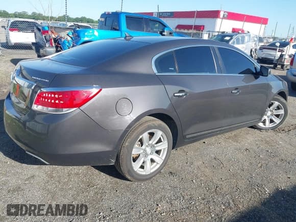 ✅ 2012 Buick LaCrosse Leather • VIN: 1G4GC5E33CF345073 • Lot: 42294945. Listed on IAAI with 104,805 mi. Free auction sales archive from the USA and detailed vehicle history report at DreamBid. Image 4.