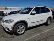 ✅ 2012 BMW X5 35d • VIN: 5UXZW0C5XCL674154 • Lot: 87085515. Listed on Copart with 174,680 mi. Free auction sales archive from the USA and detailed vehicle history report at DreamBid. Image 1.