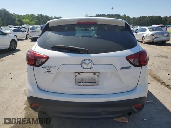 ✅ 2016 Mazda CX-5 Sport • VIN: JM3KE2BY3G0866933 • Lot: 53383095. Listed on Copart with 111,822 mi. Free auction sales archive from the USA and detailed vehicle history report at DreamBid. Image 6.