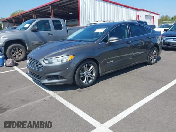 ✅ 2015 Ford Fusion Titanium Hybrid • VIN: 3FA6P0RU4FR292892 • Лот: 43271541. Опубликован ранее на IAAI с пробегом 260 001 миль. Бесплатный доступ к архиву аукционных продаж из США и подробный отчёт об истории автомобиля на DreamBid. Изображение 17.