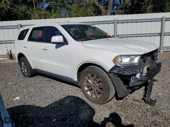 2017 Dodge Durango SXT with VIN 1C4RDHAG0HC878527, listed as a Copart auction lot 90985535 with 157,382 mi miles and Clean title. Bid and sale history available at DreamBid. Image 4.