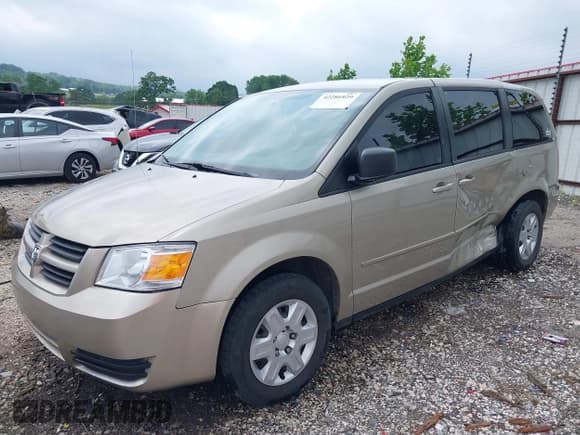 ✅ 2009 Dodge Grand Caravan SE • VIN: 2D8HN44E89R687315 • Lot: 42286929. Listed on IAAI with 215,894 mi. Free auction sales archive from the USA and detailed vehicle history report at DreamBid. Image 2.