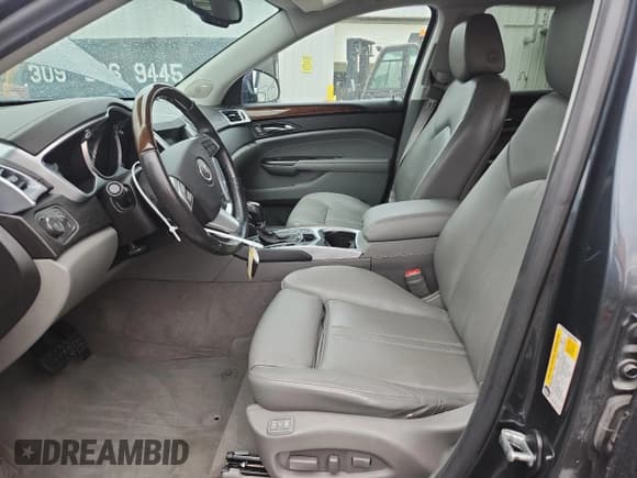 ✅ 2012 Cadillac SRX Performance Collection • VIN: 3GYFNBE30CS598950 • Lot: 81205505. Listed on Copart with 96,413 mi. Free auction sales archive from the USA and detailed vehicle history report at DreamBid. Image 7.