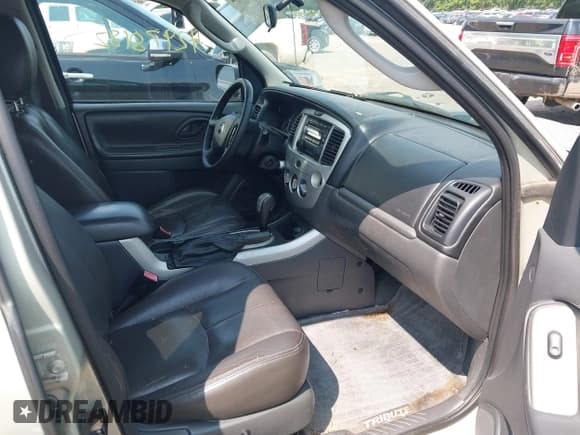 ✅ 2006 Mazda Tribute i • VIN: 4F2YZ02Z06KM13747 • Lot: 42978182. Listed on IAAI with 173,940 mi. Free auction sales archive from the USA and detailed vehicle history report at DreamBid. Image 5.