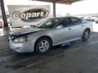 ✅ 2004 Pontiac Grand Prix GT1 • VIN: 2G2WP522741197040 • Lot: 68385175. Listed on Copart with 288,541 mi. Free auction sales archive from the USA and detailed vehicle history report at DreamBid. Image 1.