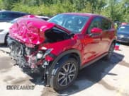 ✅ 2018 Mazda CX-5 Touring • VIN: JM3KFBCM7J0444602 • Lot: 43083220. Listed on IAAI with 77,993 mi. Free auction sales archive from the USA and detailed vehicle history report at DreamBid. Image 2.