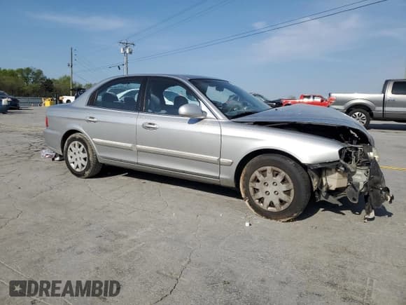 ✅ 2004 Kia Optima LX • VIN: KNAGD126045301139 • Lot: 52876615. Listed on Copart with 165,480 mi. Free auction sales archive from the USA and detailed vehicle history report at DreamBid. Image 4.