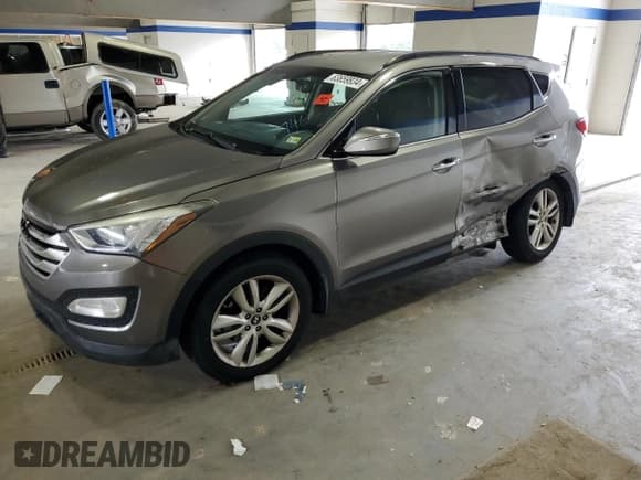 ✅ 2014 Hyundai Santa Fe • VIN: 5XYZU3LA6EG207690 • Лот: 63659934. Опубликован ранее на Copart с пробегом 76 843 миль. Бесплатный доступ к архиву аукционных продаж из США и подробный отчёт об истории автомобиля на DreamBid. Изображение 1.