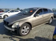 ✅ 2009 Mercedes-Benz R 3.5L • VIN: 4JGCB65E69A090840 • Лот: 81056185. Опубликован ранее на Copart с пробегом 174 986 миль. Бесплатный доступ к архиву аукционных продаж из США и подробный отчёт об истории автомобиля на DreamBid. Изображение 1.