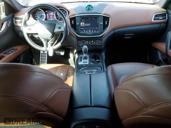 ✅ 2016 Maserati Ghibli • VIN: ZAM57XSA6G1171223 • Lot: 56347325. Wystawiony na Copart z przebiegiem 74 018 mil. Bezpłatny archiwum sprzedaży aukcyjnych z USA i szczegółowy raport historii pojazdu na DreamBid. Zdjęcie 8.