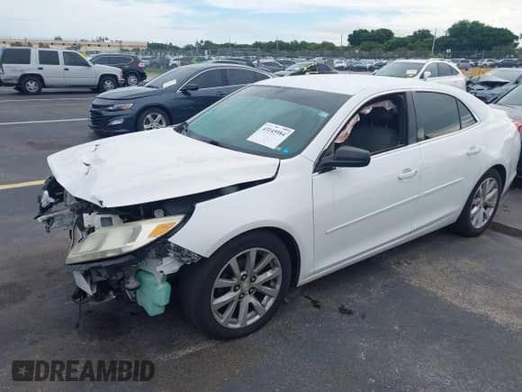 2015 Chevrolet Malibu LS with VIN 1G11A5SL1FU121779, listed as a IAAI auction lot 43145984 with 149,524 mi miles and . Bid and sale history available at DreamBid. Image 2.