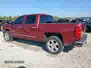 2015 Chevrolet Silverado 1500 LT with VIN 3GCPCREC7FG297544, listed as a Copart auction lot 82291355 with 133,901 mi miles and Salvage title. Bid and sale history available at DreamBid. Image 2.