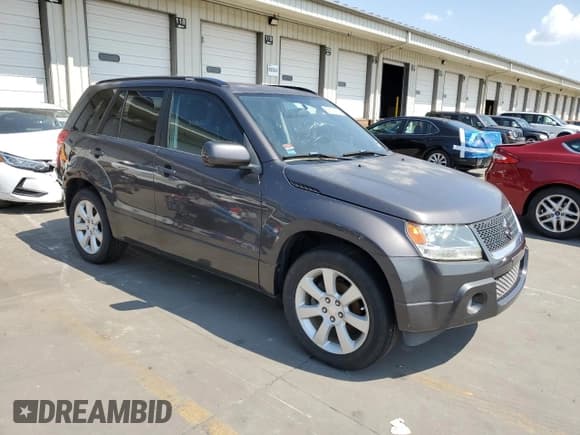✅ 2012 Suzuki Grand Vitara Limited • VIN: JS3TE0D75C4100079 • Lot: 68521615. Listed on Copart with 52,045 mi. Free auction sales archive from the USA and detailed vehicle history report at DreamBid. Image 4.
