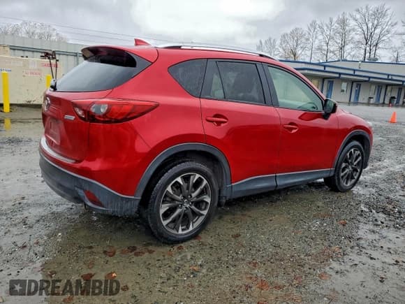✅ 2016 Mazda CX-5 Grand Touring • VIN: JM3KE4DY4G0703846 • Lot: 93990465. Listed on Copart with 86,638 mi. Free auction sales archive from the USA and detailed vehicle history report at DreamBid. Image 3.