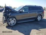 ✅ 2013 Mercedes-Benz GL 550 • VIN: 4JGDF7DE6DA240633 • Лот: 70827595. Опубликован ранее на Copart с пробегом 80 437 миль. Бесплатный доступ к архиву аукционных продаж из США и подробный отчёт об истории автомобиля на DreamBid. Изображение 1.