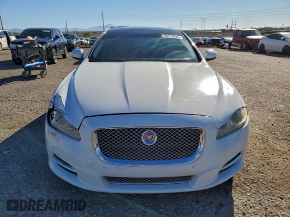 ✅ 2014 Jaguar XJ • VIN: SAJWA1CZ5E8V65670 • Lot: 94516925. Wystawiony na Copart z przebiegiem 102 690 mil. Bezpłatny archiwum sprzedaży aukcyjnych z USA i szczegółowy raport historii pojazdu na DreamBid. Zdjęcie 5.