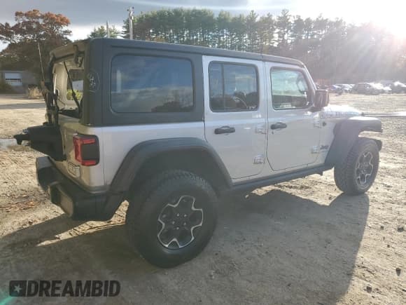 ✅ 2023 Jeep Wrangler Rubicon • VIN: 1C4JJXR61PW630974 • Lot: 90245445. Listed on Copart with 57,589 mi. Free auction sales archive from the USA and detailed vehicle history report at DreamBid. Image 3.