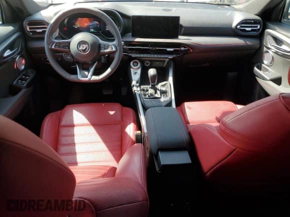 2024 Dodge Hornet R/T Plus z VIN ZACPDFDW8R3A09306, wystawiony jako Copart lot #54002945 z przebiegiem 11 694 mil mil oraz Szkoda całkowita • Salvage title. Historia ofert i sprzedaży dostępna na DreamBid. Obrazek 8.