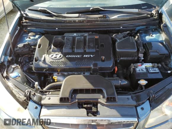 2007 Hyundai Elantra GLS z VIN KMHDU46D87U114589, wystawiony jako Copart lot #75061884 z przebiegiem 203 747 mil mil oraz Szkoda całkowita • Salvage title. Historia ofert i sprzedaży dostępna na DreamBid. Obrazek 11.