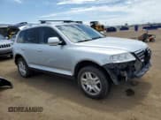✅ 2007 Volkswagen Touareg • VIN: WVGZB77L37D023734 • Lot: 61074104. Listed on Copart with 121,784 mi. Free auction sales archive from the USA and detailed vehicle history report at DreamBid. Image 4.
